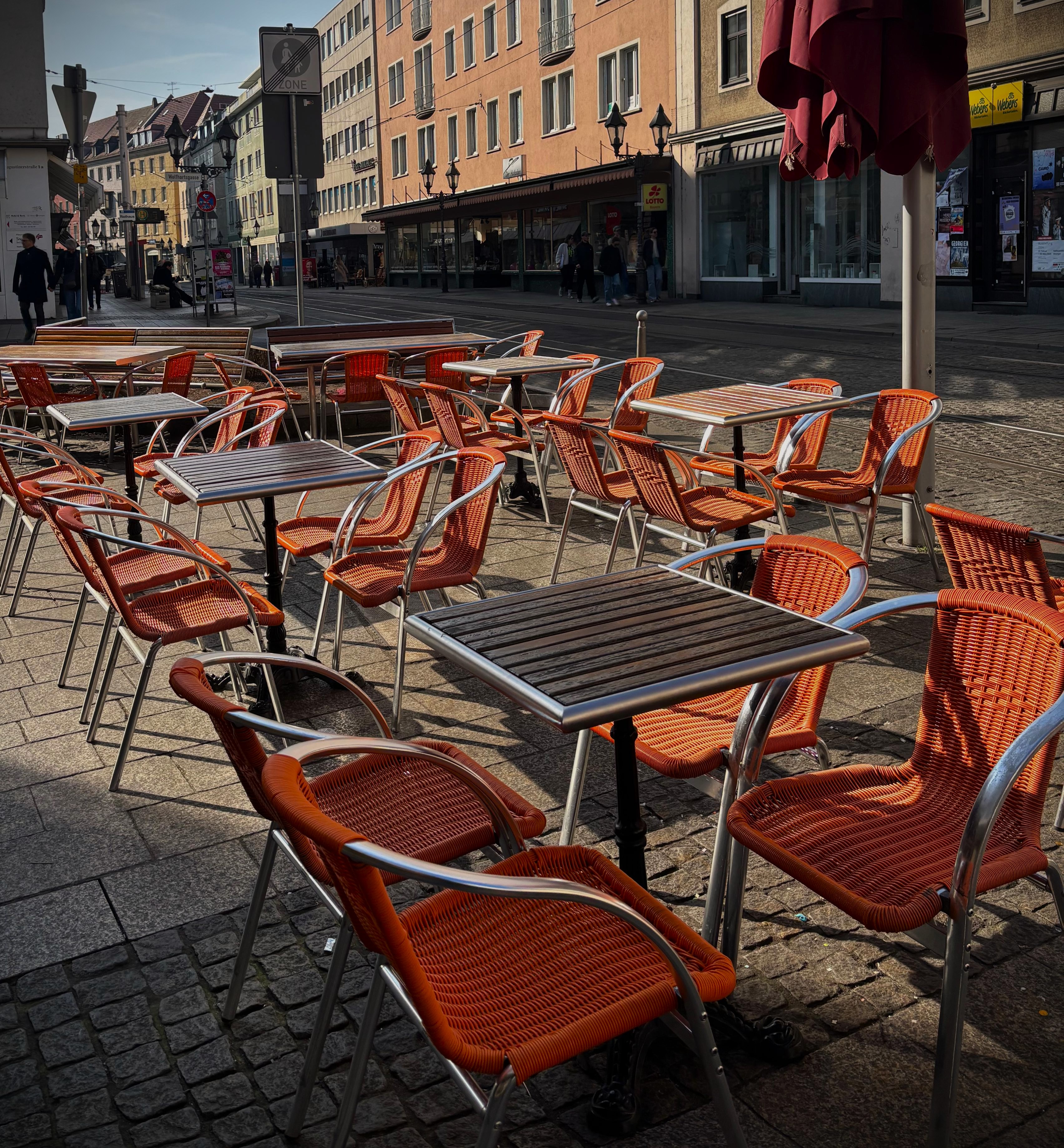 Sunlit lively terrace seating